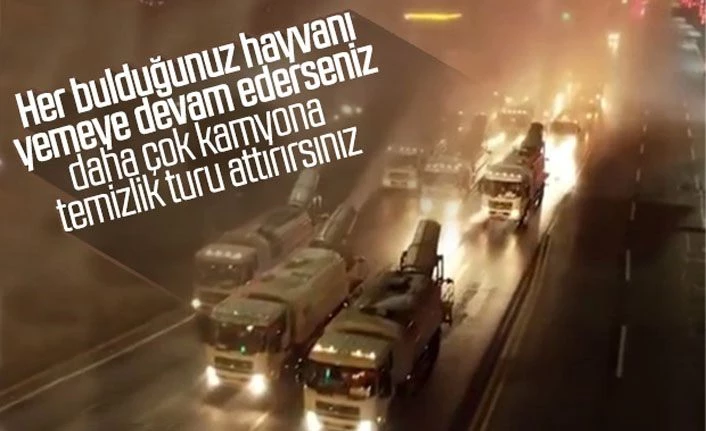 Çin'de sokaklar kamyonlarla dezenfekte ediliyor